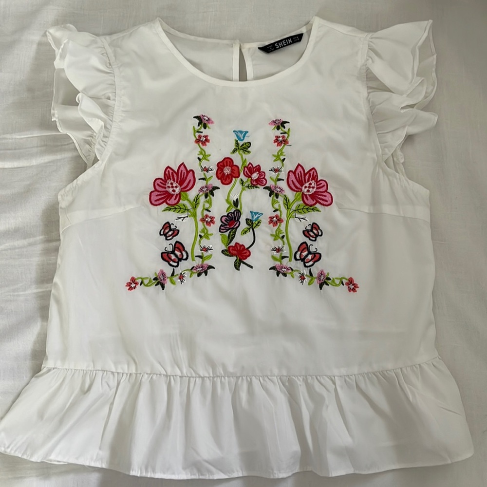 Embroidered white ruffle sleeve blouse